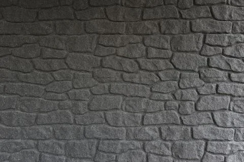 Black stone wall background Foto stock