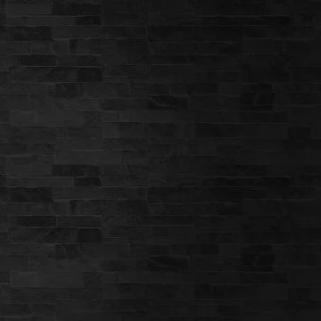 The black stone wall pattern texture background. Stock Photos