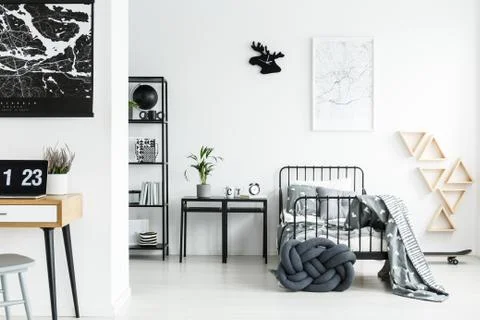 Black stools next to bed Stock-Fotos