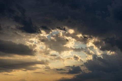 Black storm clouds are gathering in the sky Stock Photos