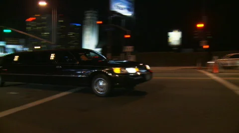 Black Stretch Limo Drives Through Hollywood Stock Footage 648143