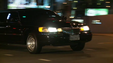 Black Stretch Limo Drives Through Intersection Stock Footage 648178