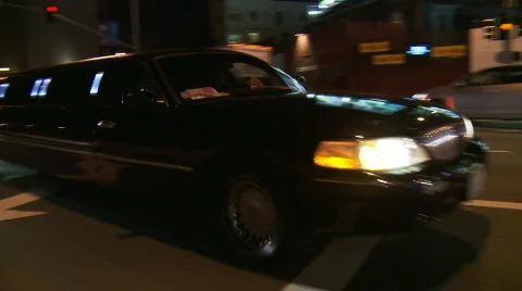 Black Stretch Limo Makes Right Turn Stock Footage 648225