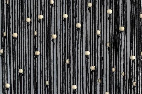 Black strings with beads Stock Photos