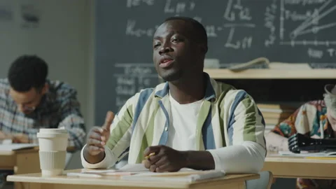 Black Student Asking Question on College Lesson Stock Footage 205039897