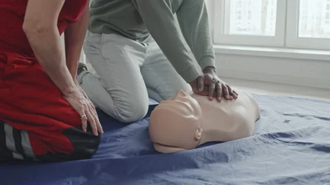 Black Student Practicing CPR On Dummy Stock Footage 223931310