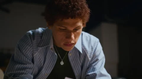Black Student Reviewing Script during Acting Class Rehearsal Stock Footage 344518808