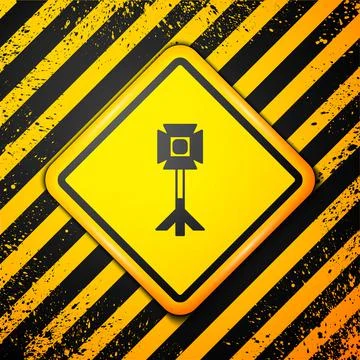 Black Studio light bulb in softbox icon isolated on yellow background. Shadow Illustrazione stock