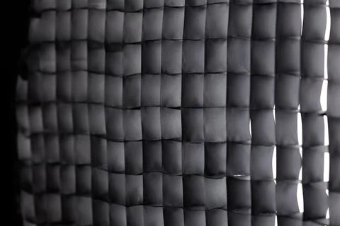 Black studio lighting softbox grid modifier abstract background Stock-Fotos