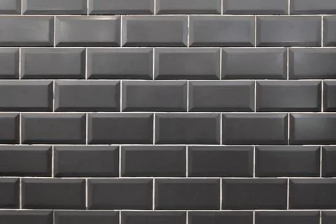 Black subway faience wall Stock Photos