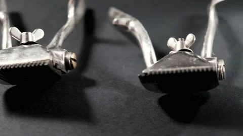 On a black surface are old barber tools. Vintage Stock Footage 143176250