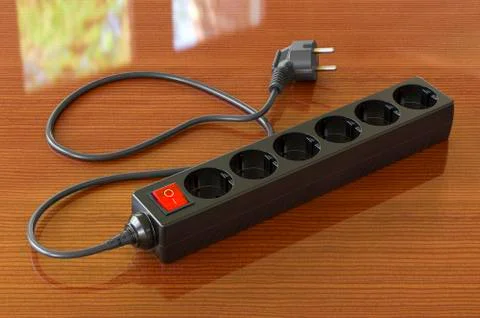 Black surge protector or spike suppressor on the wooden table, 3D rendering Illustrazione stock
