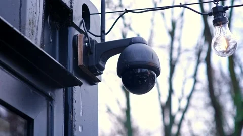 Black Surveillance CCTV Security Camera Installed on Building Corner Stock Footage 166441518