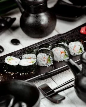 Black sushi with rice on the table Stock Photos