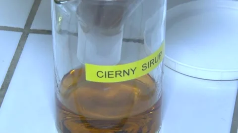 Black Syrup Sample in Sugar Refinery Laboratory Video stock 343663116