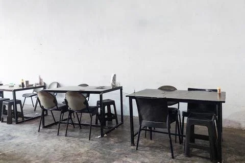Black table and chairs interior Stock Photos