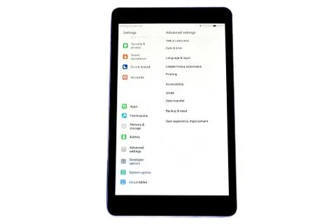 Black tablet computer isolated on white background Stock Photos