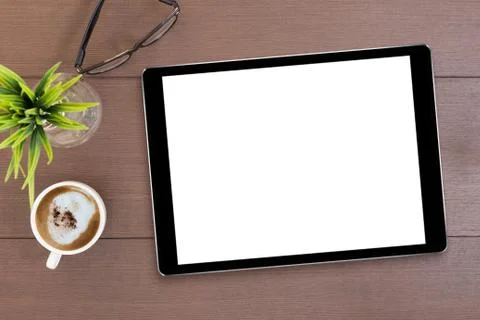 Black tablet white screen on table top view Foto stock
