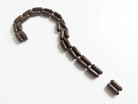 Black tablets in the form of a question mark Stock Photos