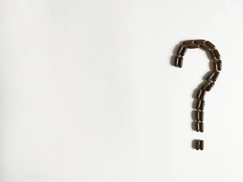 Black tablets in the form of a question mark with place for text Foto stock