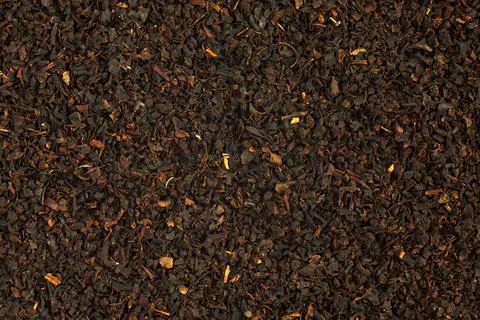 Black tea blend texture background closeup isolated top view Stock Photos