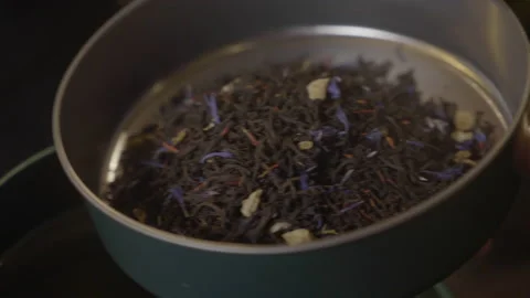 Black tea in a container Stock Footage 176462453