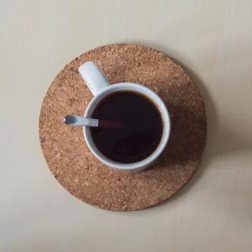 Black tea on a cork stand Stock Photos