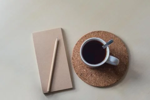 Black tea on a cork stand Stock Photos