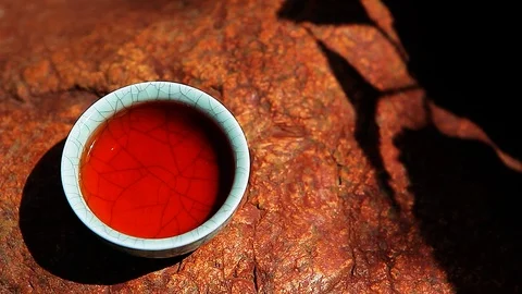 Black tea cup stone background nobody Stock Footage 108611852