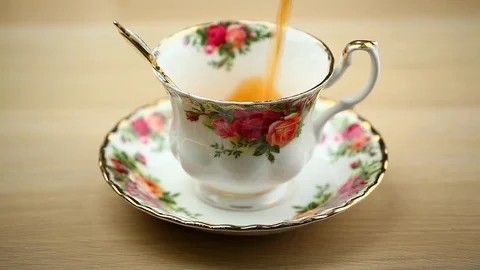 Black tea cup wooden table hd footage Stock Footage 101335476