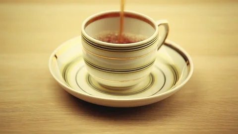 Black tea cup wooden table hd footage Stock Footage 101335922