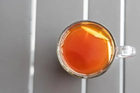 Black tea with ginger slice or known as Teh O Halia Stock Photos