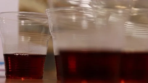 Black tea in glasses for tasting Stock Footage 75475394