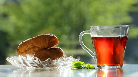 Black tea in glass,transparent cup at breakfast Stock Footage 50055389