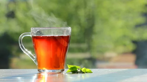 Black tea in glass,transparent cup at breakfast Stock Footage 50055448