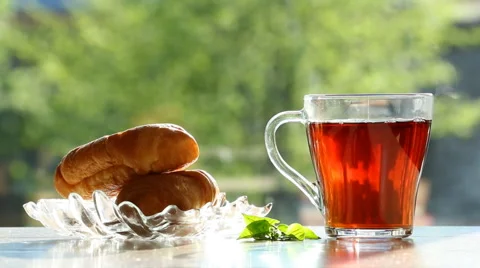 Black tea in glass,transparent cup at breakfast Stock Footage 50055471
