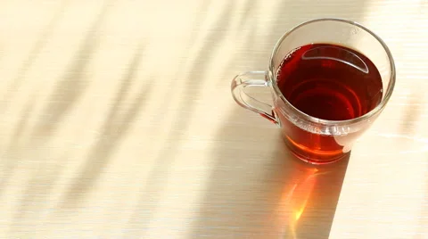 Black tea in glass,transparent cup at breakfast Video stock 50055495
