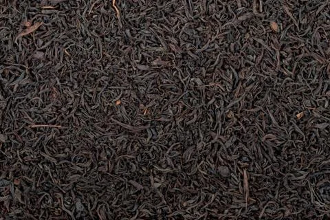 Black tea leaves background Stock Photos
