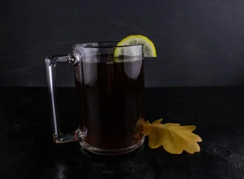 Black tea with lemon oak leaf Stock Photos