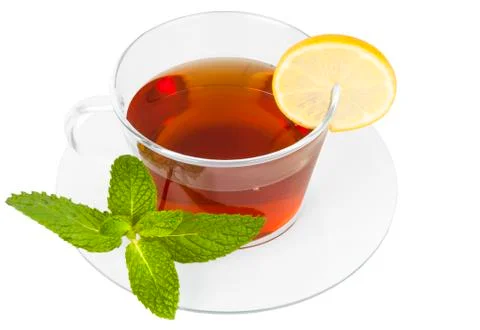 Black tea with lemon on white background 写真素材