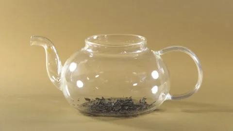 https://images.pond5.com/black-tea-pouring-empty-glass-footage-252668677_iconl.jpeg