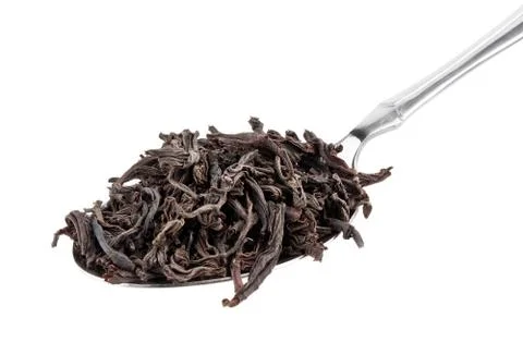 Black tea in spoon Stock Photos