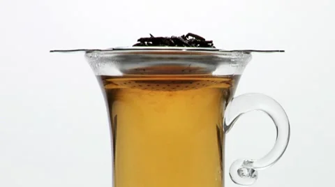 Black tea in a tea glass Stock Footage 8572991