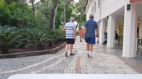 Black tea in teapot over small candle by ashtray on table Stock Footage 112404711