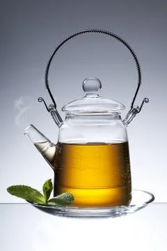 Black tea in teapot Stock Photos