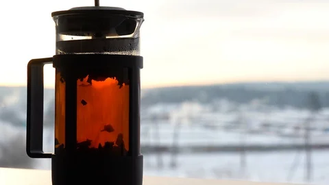 Black tea in water closeup on window. Stock Footage 129416268