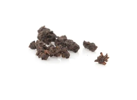 Black tea on a white background. macro Stock Photos