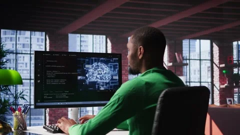 Black tech engineer programming an AI brain neural network for machine learning Stock Footage 309109668