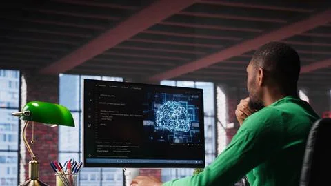Black tech engineer programming an AI brain neural network for machine learning Foto stock