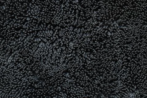 Black terry cloth background with loop texture, soft textile template for d.. Foto stock